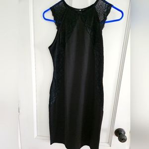 Black with lace pattern. Size small H&M.